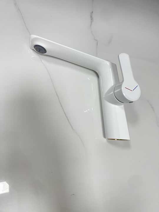 Modern Luxury White Brass Bathroom Faucet Hot and Cold Basin Mixer for Hotels and Luxury Bathrooms